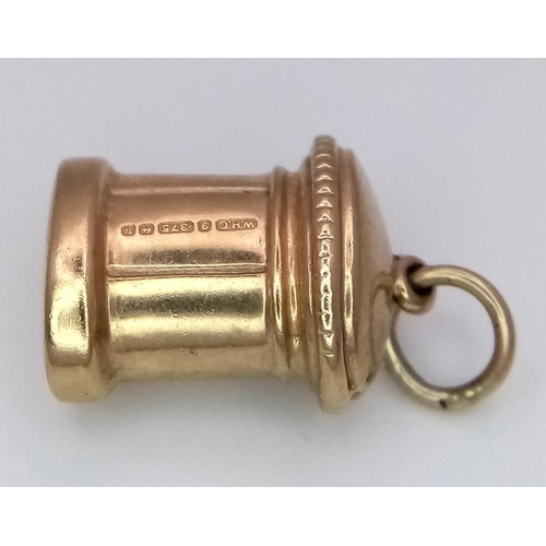 1377 - A 9K YELLOW GOLD POST BOX CHARM. 1.1G