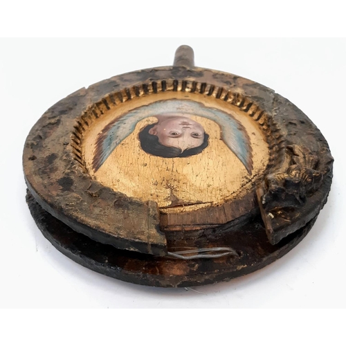 817 - An Antique (Possibly Russian) Liturgical Fan. Oil on wood panel in the form of a winged angel. It wo... 