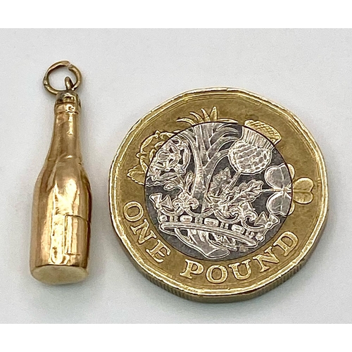 1290 - 9k yellow gold champagne bottle charm 0.7g