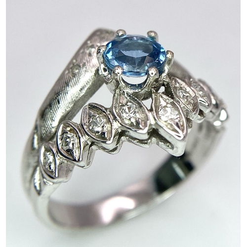 555 - A 14K WHITE GOLD DIAMOND & BLUE TOPAZ RING - 6.2G. SIZE Q