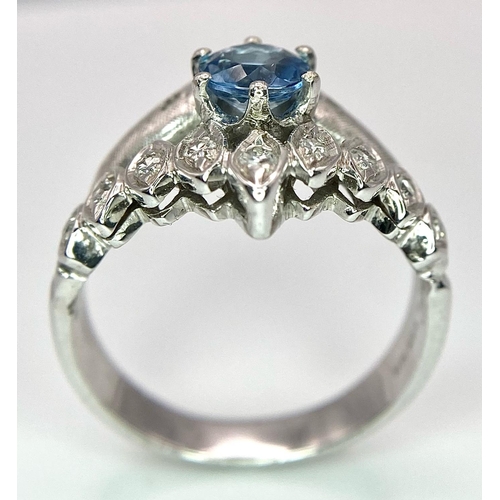 555 - A 14K WHITE GOLD DIAMOND & BLUE TOPAZ RING - 6.2G. SIZE Q