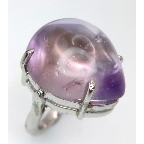 162 - An Amethyst Cabochon 925 Silver Ring. 45ct. W-16g. Size P/Q. Comes with a presentation case. Ref: VO... 