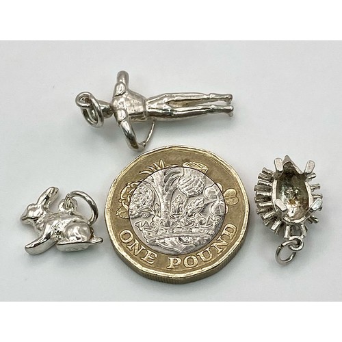 1423 - Sterling silver selection of 3 charms including rabbit, hedgehog and man, 6.3g total weight.