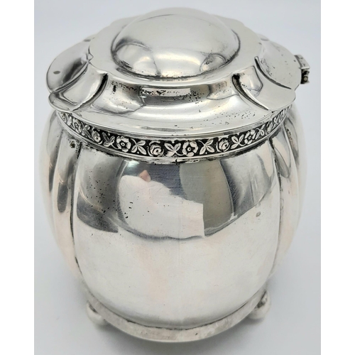 1414 - An Antique Austro-Hungarian Empire Silver Lidded Bowl. Decorative rim, four pedestal-ball feet. Gild... 