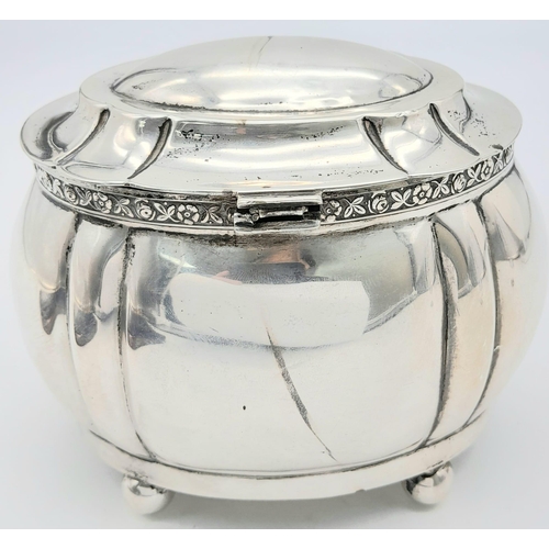 1414 - An Antique Austro-Hungarian Empire Silver Lidded Bowl. Decorative rim, four pedestal-ball feet. Gild... 