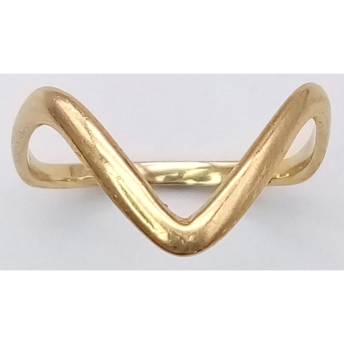 1498 - A 9K GOLD WISHBONE RING . 1.1gms   size K