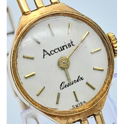 298 - A Vintage Accurist 9K Gold Ladies Watch. 9k gold bracelet and case - 15mm. White dial. Quartz moveme... 