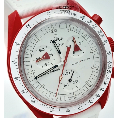 778 - An Omega X Swatch Bioceramic Mission To Mars Chronograph Watch. Red ceramic case - 42mm. White dial ... 