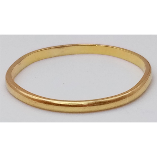 825 - A 22K GOLD SLIM BAND RING .  1.3gms