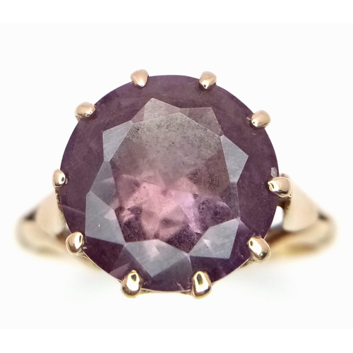 1453 - A Vintage 9K Yellow Gold Amethyst Ring. Round cut amethyst. Size M. 3.05g weight.