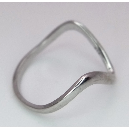 1491 - A 10K WHITE GOLD WISHBONE RING .  1.2gms   size J/K