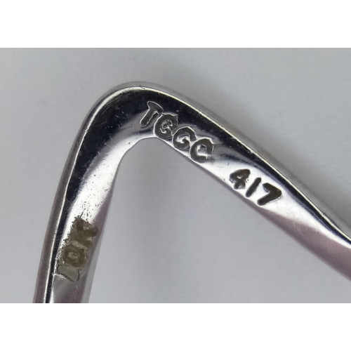 1491 - A 10K WHITE GOLD WISHBONE RING .  1.2gms   size J/K