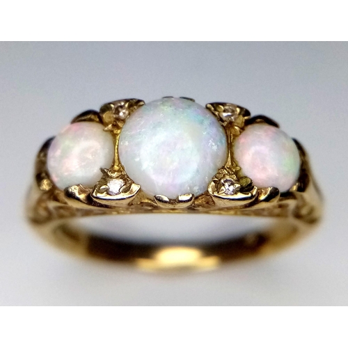 40 - A Wonderful Vintage 9K Yellow Gold and Three Opal Ring. Excellent colour-play. Size I. 3.25g weight.