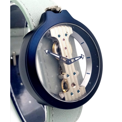 779 - A Verticale Mechanical Top Winder Gents Watch. Blue leatherstrap. Ceramic blue skeleton case - 42mm.... 