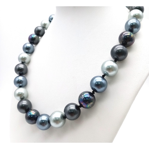 1424 - A Mysterious Metallic Shades of Grey and Silver South Sea Pearl Shell Necklace. 12mm beads. 42cm len... 