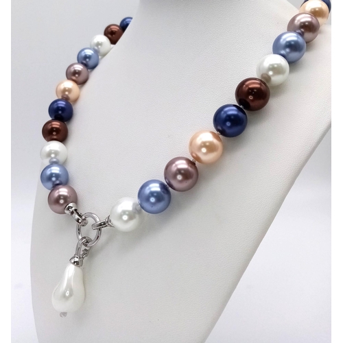 310 - A Vibrant  Multi-Colour South Sea Pearl Shell Bead Necklace with a Baroque Pearl Pendant. Lovely met... 