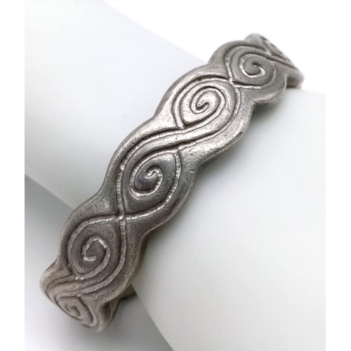 472 - A Handcrafted Celtic Silver Cuff Bangle - Made by Carrick Art. A mixture of silver and pewter as use... 