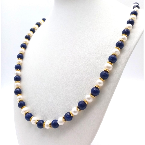 A Matinee Length Lapis Lazuli and Cultured Pearl Necklace. 7/8mm lapis ...