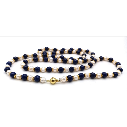 A Matinee Length Lapis Lazuli and Cultured Pearl Necklace. 7/8mm lapis ...