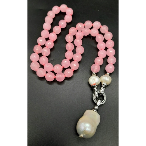 737 - A Very Different Pink Jade and White Keisha Baroque Pearl Necklace. 10mm jade beads give way to an i... 