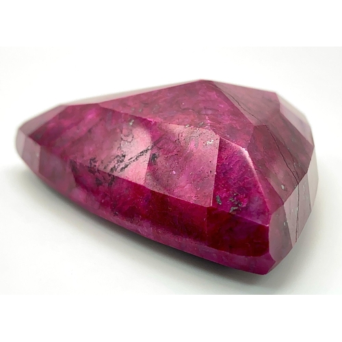 208 - A majestic, large (754 carats), NATURAL RUBY, cut and polished, exhibiting beautiful secondary hornb... 