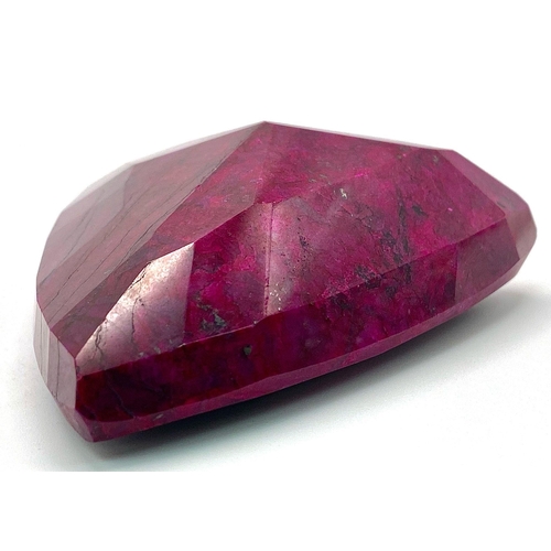 208 - A majestic, large (754 carats), NATURAL RUBY, cut and polished, exhibiting beautiful secondary hornb... 