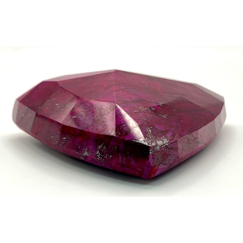 208 - A majestic, large (754 carats), NATURAL RUBY, cut and polished, exhibiting beautiful secondary hornb... 