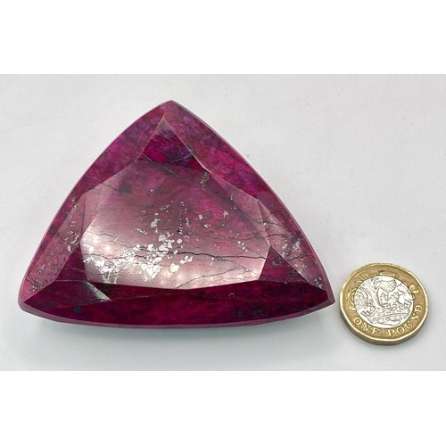 208 - A majestic, large (754 carats), NATURAL RUBY, cut and polished, exhibiting beautiful secondary hornb... 