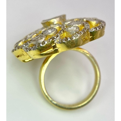 215 - A glorious, silver and gold antique ring with a central natural uncut diamond (1.1 carat appr.) surr... 