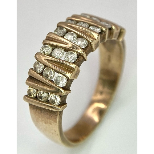 23 - A Vintage 9K Yellow Gold 21 Diamond Ring. 1ctw of brilliant round cut diamonds. Size T. 5.9g total w... 