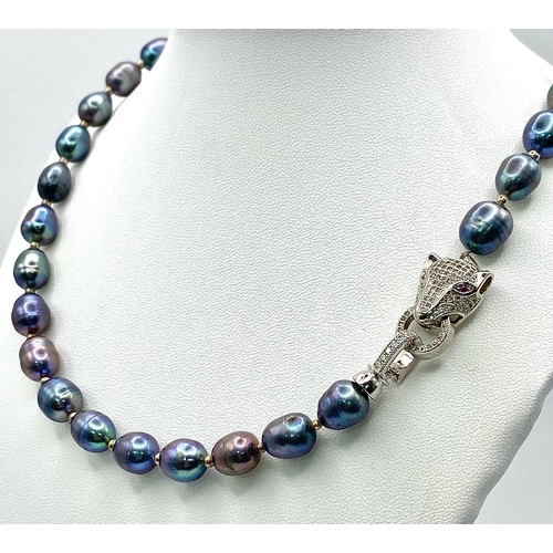 278 - A top quality, metallic grey, natural, Tahitian pearls necklace with a panther clasp adored with rub... 