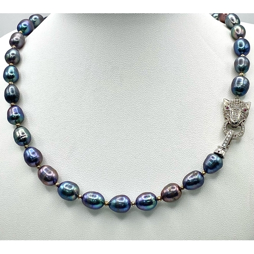 278 - A top quality, metallic grey, natural, Tahitian pearls necklace with a panther clasp adored with rub... 