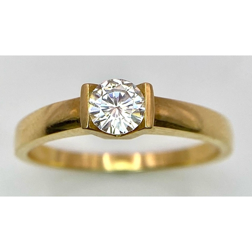 32 - A Vintage 18K Yellow Gold Diamond Solitaire Ring. 0.70ct brilliant round cut diamond. Size S. 4.65g ... 