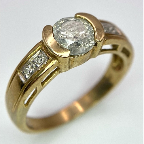 45 - A Vintage 9K Yellow Gold Diamond Ring. Central 0.8ct diamond with winged diamond accents. Size O. 3.... 