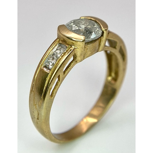 45 - A Vintage 9K Yellow Gold Diamond Ring. Central 0.8ct diamond with winged diamond accents. Size O. 3.... 