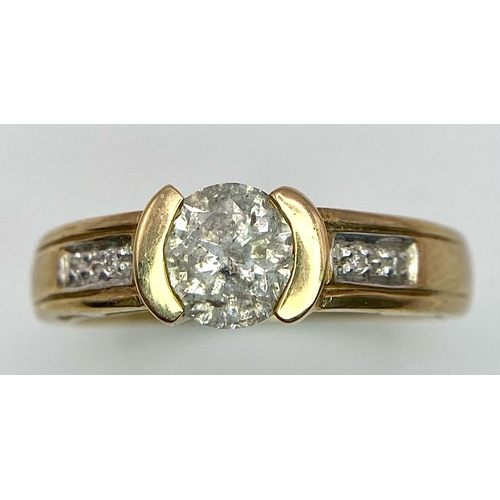 45 - A Vintage 9K Yellow Gold Diamond Ring. Central 0.8ct diamond with winged diamond accents. Size O. 3.... 