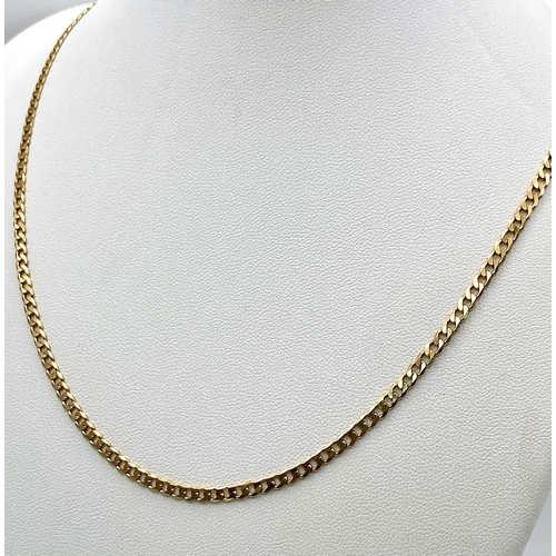 6 - A 9K Yellow Gold Flat Curb Link Chain/Necklace. 54cm length. 8.5g weight.