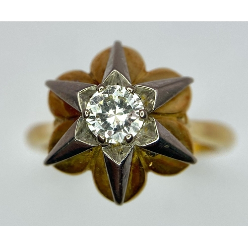 61 - A Vintage 18k Yellow Gold Diamond Solitaire Ring. Central 0.65ct brilliant round cut diamond in a de... 