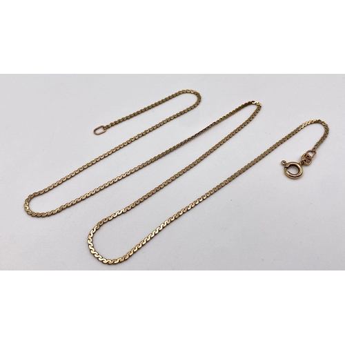 797 - A 42cms FLAT LINK DISAPPEARING NECKLACE IN 9K GOLD .   2.8gms