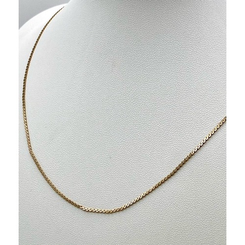 797 - A 42cms FLAT LINK DISAPPEARING NECKLACE IN 9K GOLD .   2.8gms