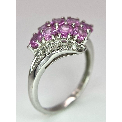 87 - A 9K White Gold Pink Topaz and Diamond Ring. Size J/K. 2.45g weight.