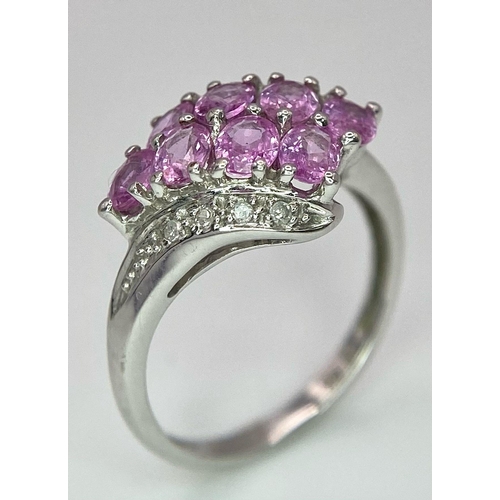 87 - A 9K White Gold Pink Topaz and Diamond Ring. Size J/K. 2.45g weight.