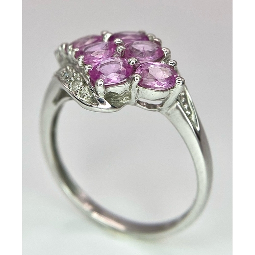 87 - A 9K White Gold Pink Topaz and Diamond Ring. Size J/K. 2.45g weight.