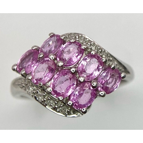 87 - A 9K White Gold Pink Topaz and Diamond Ring. Size J/K. 2.45g weight.