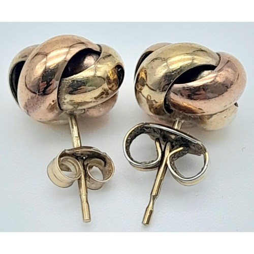 1439 - A Pair of Bi-Colour 9K Gold Knot Stud Earrings. 1.65g weight.