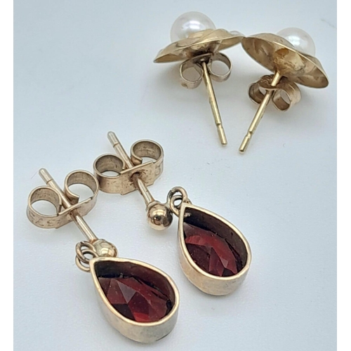 1469 - Two Different Style Pairs of 9K Gold Earrings - Cultured pearl and garnet. 2.15g total weight.