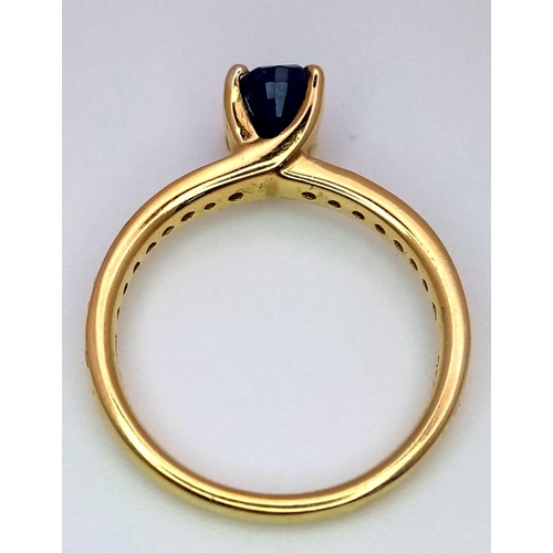 1249 - AN 18K YELLOW GOLD DIAMOND & SAPPHIRE RING - 3.7G. 0.30CT. SIZE M.