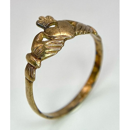 1639 - A 9K YELLOW GOLD CLADDAGH RING. 1.1G. SIZE N