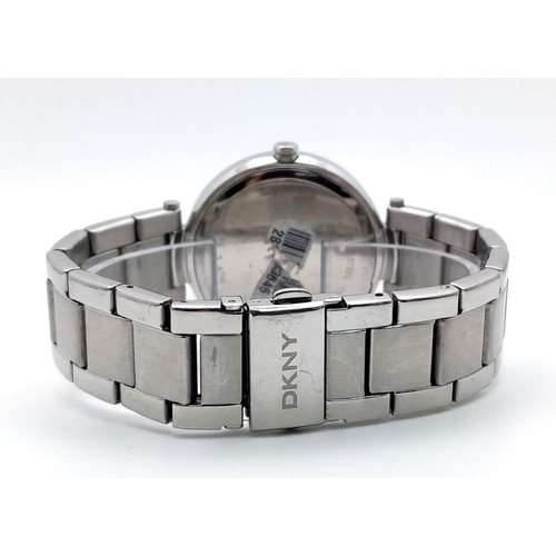 1757 - An Excellent Condition Stainless Steel Quartz Watch by Donna Karen New York (DKNY). 38mm Including C... 