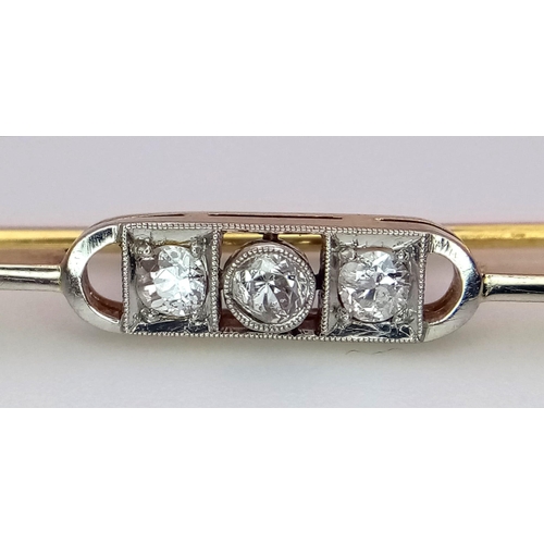 1181 - An 18k yellow gold diamond set tie pin with safety catch. 3.6g (dia:.30ct)